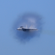 Illustration for article titled Incredible photo of an F-18 zooming through the Golden Gate bridge
